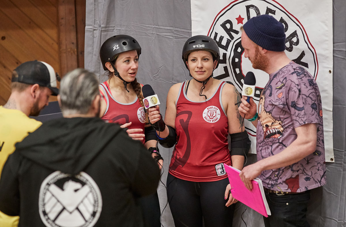 Interviewing skaters from Bear City after a bout