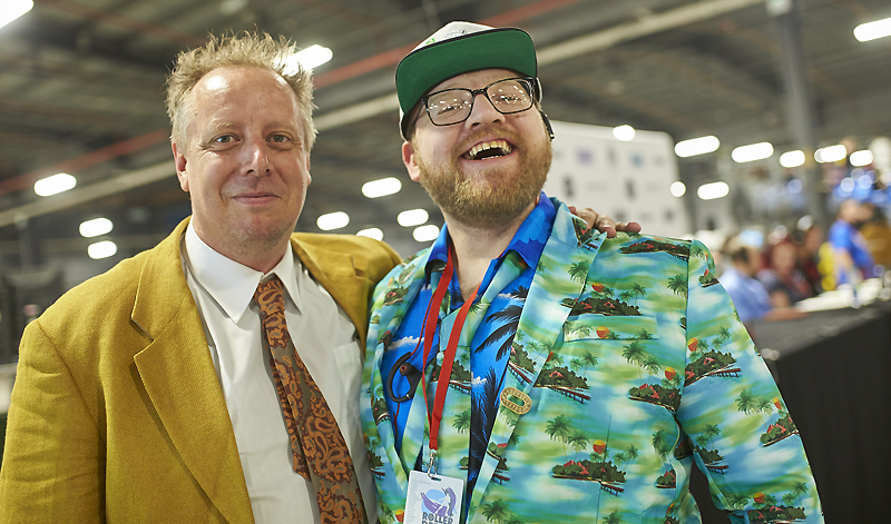 Announcers strike a pose after commentating on a bout