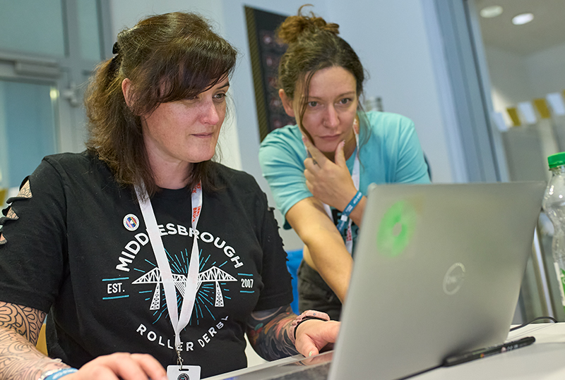 Volunteers taking on the admin, which is considerable in hosting such a large event